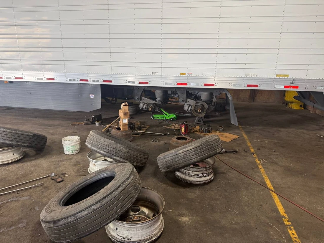 Trailer wheel end and brake job in progress